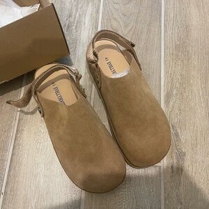 Brown clogs